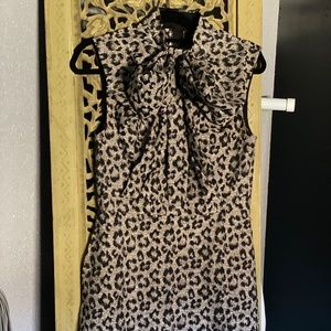 Women’s cheetah print cocktail dress.